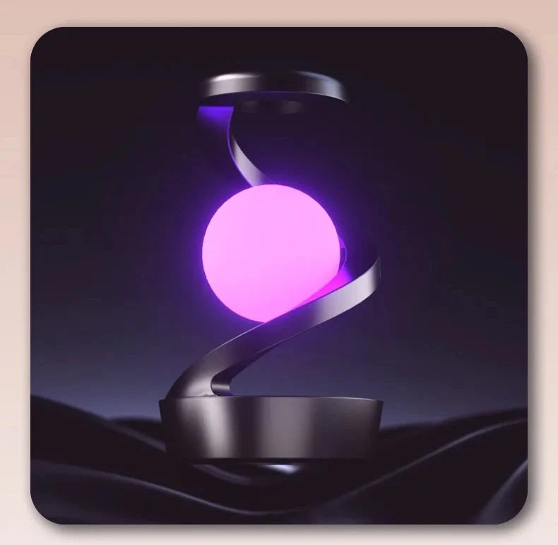 The Orbivolt™ Rotating Wireless Charging Lamp